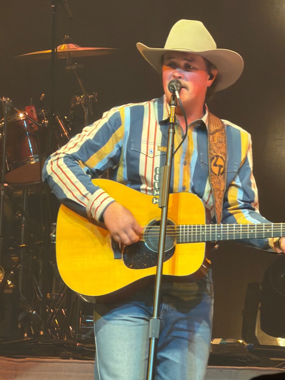Zach Top performing with an acoustic guitar