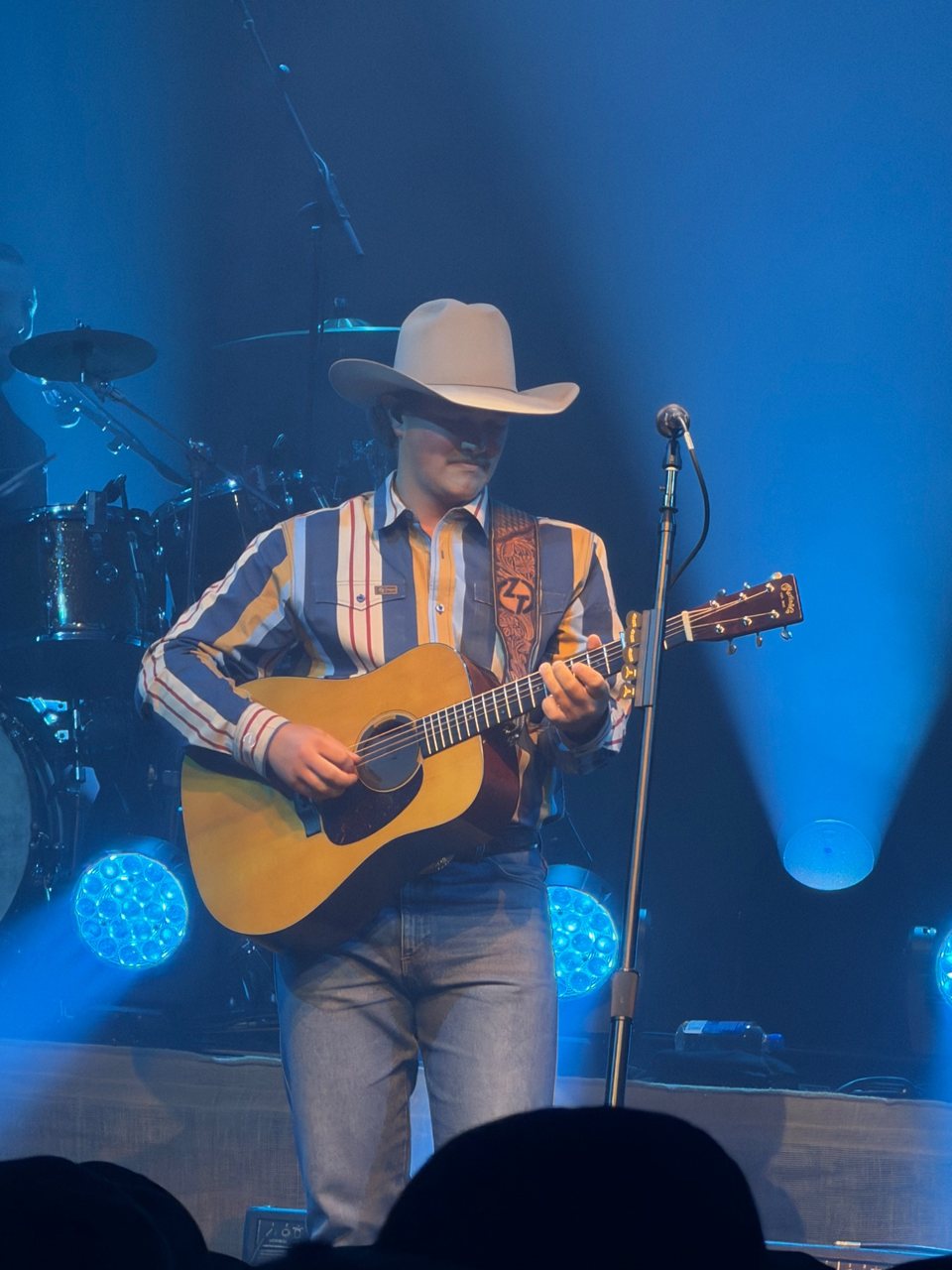Zach Top performing with an acoustic guitar